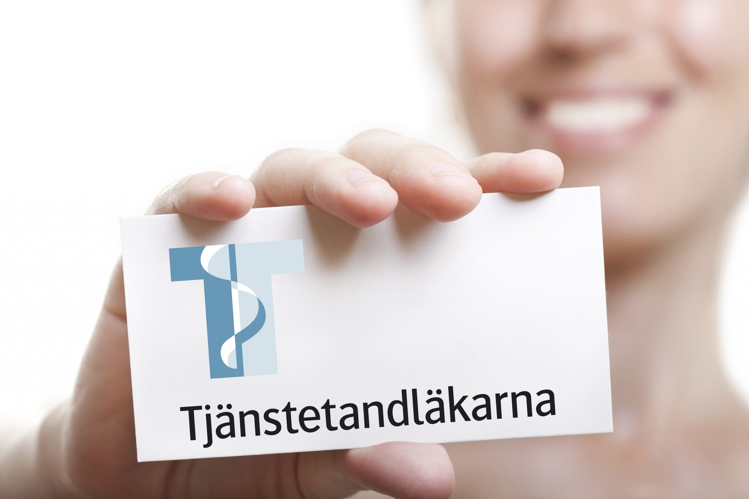 Medlemskaps-kort i hand